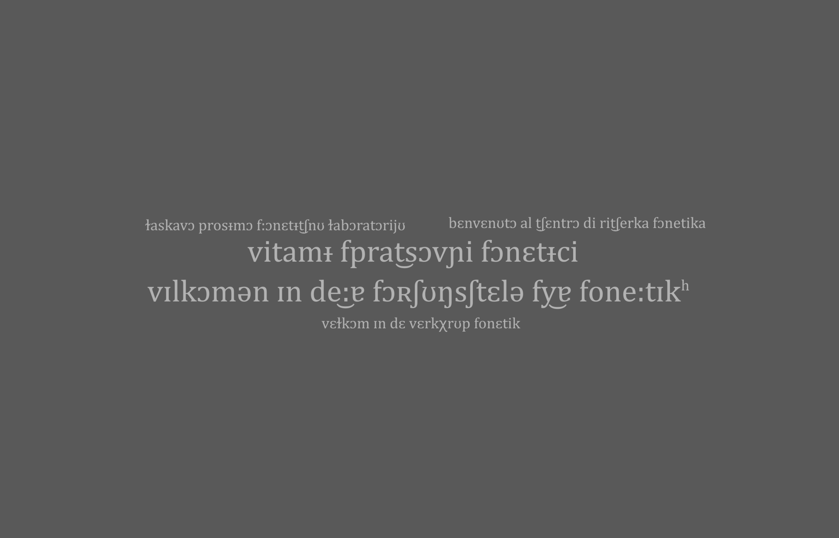 napis witamy w pracowni fonetyki w kilku językach w międzynarodowej transkrypcji fonetycznej
